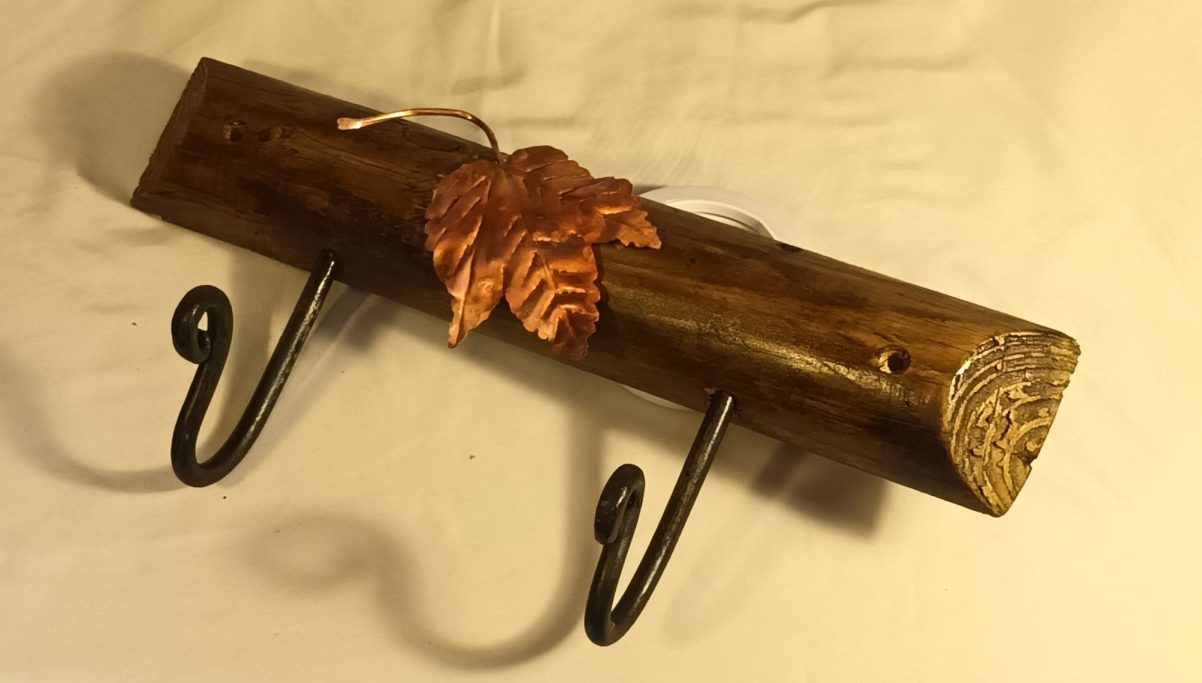 Hanger made from recycled wood and copper with two hand forged hooks